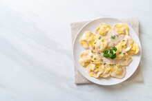 Ravioli Pasta With Mushroom Cream Sauce And Cheese