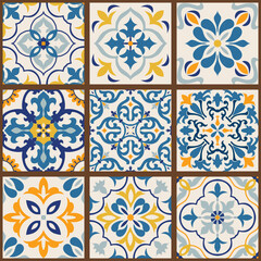 Collection of 9 colorful tiles. Seamless patchwork tile with Islam, Arabic, Indian, Ottoman motives. Majolica pottery tile, blue, yellow azulejo, original traditional Portuguese and Spain decor.