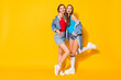 © deagreez - Full length body size view of nice attractive lovely sweet stunning charming cheerful brown-haired girls embracing sending sir kiss isolated on bright vivid shine vibrant yellow color background