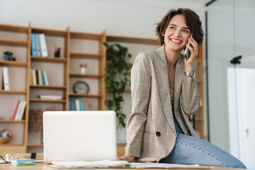 Poster - Attractive young businesswoman wearing jacket