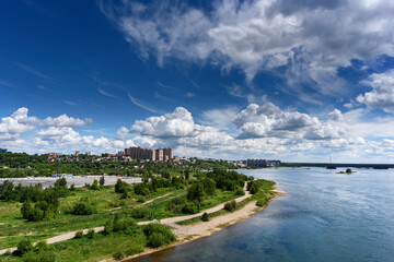 Wall Mural - Panoramic view to Irkutsk city and the Angara river from the academic bridge in sunny summer day with beautiful clouds