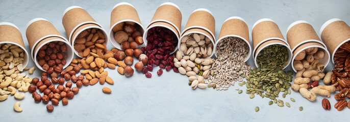 Wall Mural - Different types of Nuts in ecofriendly cups