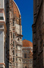 Wall Mural - Gothic and Renaissance architecture in Florence, partial view of Santa Maria del Fiore (St Mary of the Flower) dome, chapel and bell tower (14-15th century)