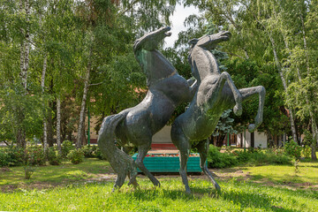 Karadjordjevo, Serbia - June 02, 2020: A large sculpture of two horses in a park in Karadjordjevo, Serbia.