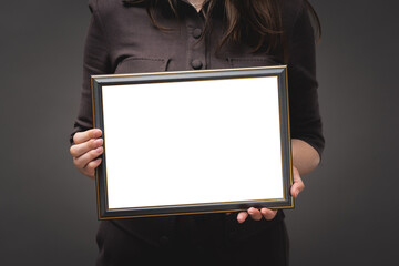 Blank diploma certificate mockup in female hands close up.