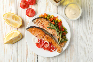 Wall Mural - Composition with tasty grilled salmon on wooden background, top view