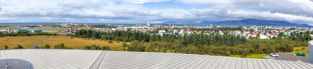 Sticker - Panoramic aerial view of Reykjavik from a city rooftop in summer season