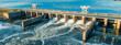 Aerial panoramic view of Hydroelectric Dam on river.