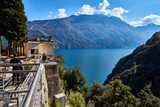 Fototapeta Natura - RIVA DEL GARDA, ITALY - October 21, 2016: Panoramic picture of Lake Garda taken in Riva del Garda which is situated in the northern part of the largest Italian lake