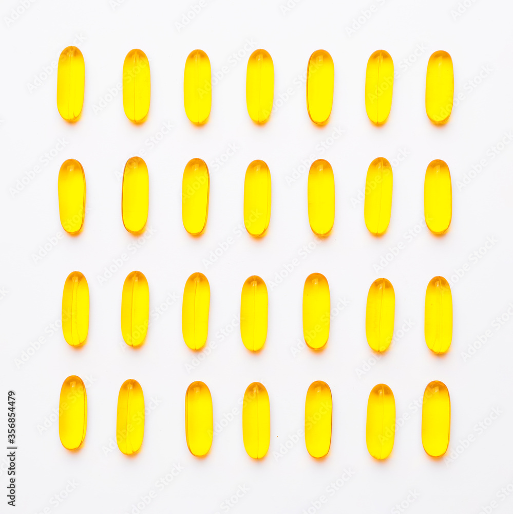 Fish oil capsules on white background