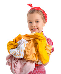 Wall Mural - Little girl with dirty laundry on white background