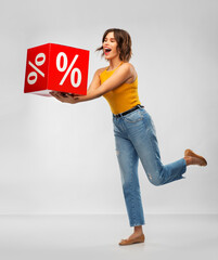 Sticker - shopping, consumerism and people concept - happy smiling young woman in mustard yellow top and jeans with sale sign over grey background