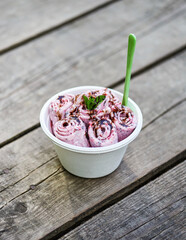 Aufkleber - Berry ice cream with mint leaf on gray wooden background