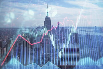 Forex graph on city view with skyscrapers background double exposure. Financial analysis concept.