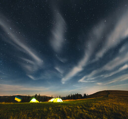 Wall Mural - scenic image of the night sky above the campsite.