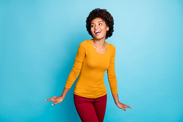 Poster - Portrait of cheerful funny cute lovely afro american girl enjoy autumn fall event free time wear pullover isolated over blue color background