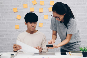 man woman colleagues analyzing data on computer. startup teamwork team working at office