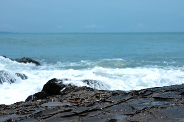 Wave crashing on the rocky reef