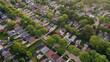 © alenamozhjer - Aerial view of american suburb at summertime.  Establishing shot of american neighborhood. Real estate, residential houses. Drone shot, from above
