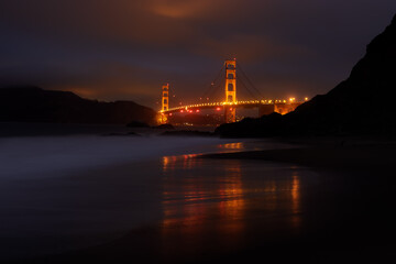 Wall Mural - Golden Gate Bridge Glowing in the Dark, via Baker Beach
