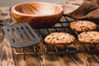 © alexey351 - Cooling rack with cookies/Cooling rack with chocolate chip cookies on wooden background