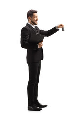 Canvas Print - Full length profile shot of a businessman giving car keys