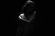 © eugenepartyzan - Nude Woman silhouette in the dark