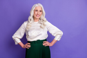 Sticker - Portrait of candid lovely old woman put hands waist look good enjoy her clothes isolated over vibrant color background