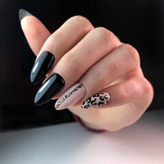 Woman with stylish black manicure on background, closeup