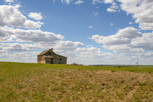 Abandoned Farmhouse On The Prairie Of Saskatchewan Near The Town Of Leader