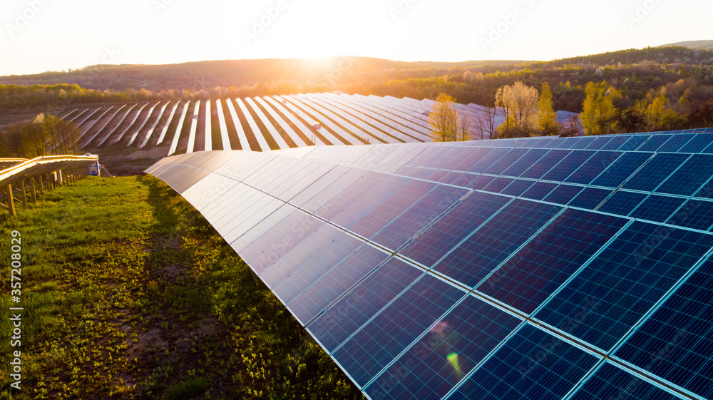 Solar panels (solar cell) in solar farm with sun lighting to create the clean electric power - obrazy, fototapety, plakaty 