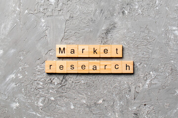 Market Research word written on wood block. Market Research text on cement table for your desing, concept