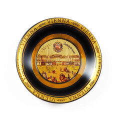 Wall Mural - Magnetic souvenir in the form of a porcelain plate from Vienna (Austria) isolated on white background. The inscription in German means in English 