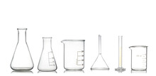 Group Of Laboratory Glassware With Reflection Isolated On White Background.