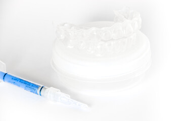 Wall Mural - Teeth tray for dental whitening opalescence and bleaching gel syringe
