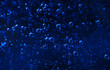 © OMG Snap - Background of the bubble in dark blue water