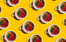 Pattern Of Colanders With Colorful Pasta