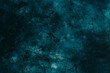 stucco texture, dark blue-green background, banner