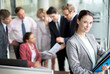 © Paul Bradbury/KOTO - Business woman smiling in office