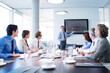 © Chris Ryan/KOTO - Business people talking in meeting