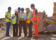 © Martin Barraud/KOTO - Workers and business people talking on site