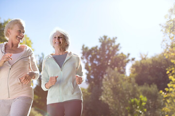 Senior women running outdoors