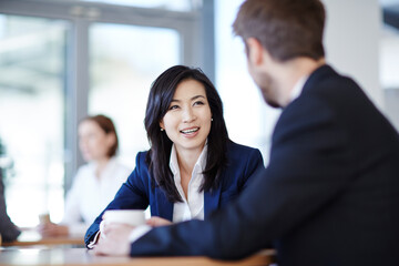 business people talking in cafe