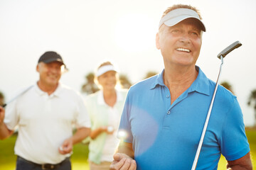 Senior adults on golf course