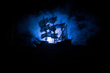 Black Silhouette Of The Pirate Ship In Night