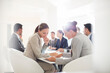 © Tom Merton/KOTO - Business people meeting at conference table