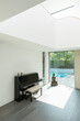 © Astronaut Images/KOTO - Piano and Buddha statue in modern house