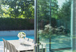© Astronaut Images/KOTO - Table and chairs by swimming pool