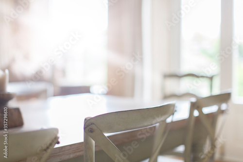 Fotografía Close up of chairs at dining room table