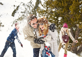 Friends playing in the snow 